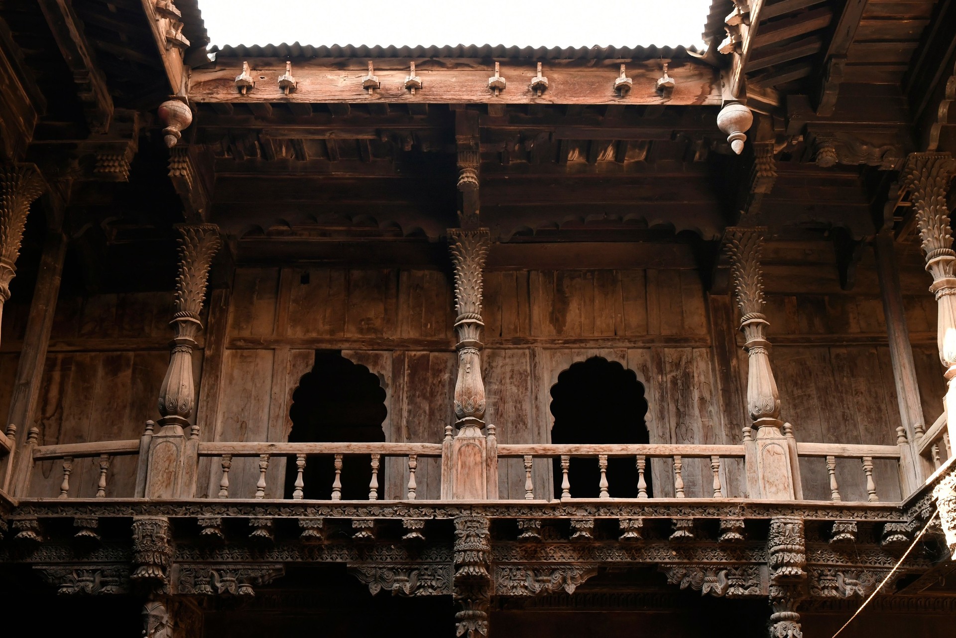 Structural wood work and heavily carved wooden members Palashikar wada, Palashi, Ahmednagar